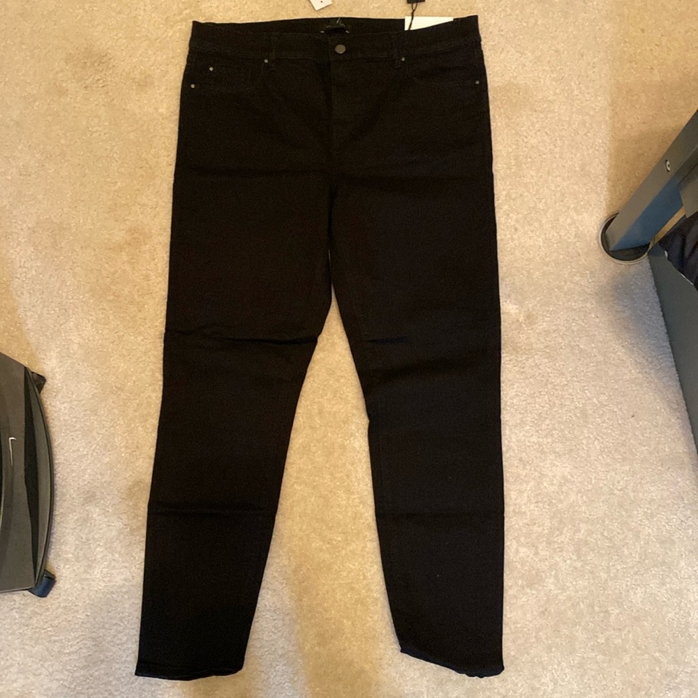 Brand new, tag on, Ann Taylor “The Skinny” mid rise jeans in black, size 14.